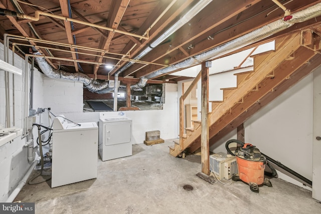 basement featuring washing machine and dryer