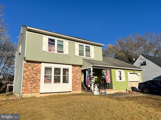 view of front property featuring a porch and a front lawn