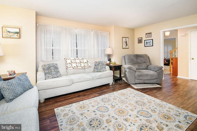 living room featuring dark hardwood / wood-style floors