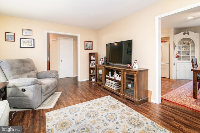 living room featuring dark hardwood / wood-style floors