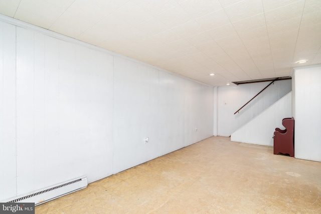 basement featuring a baseboard heating unit