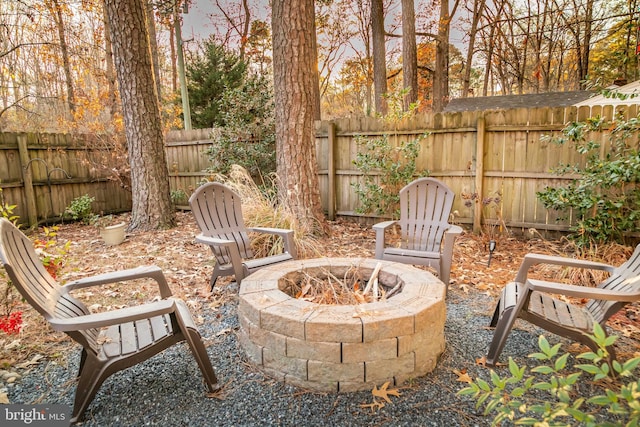 view of patio / terrace featuring an outdoor fire pit