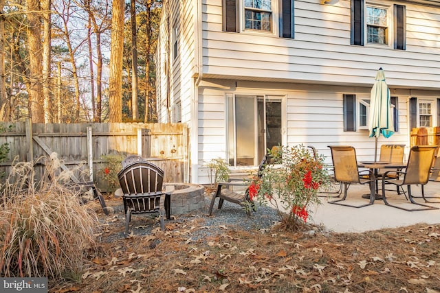 view of patio / terrace with an outdoor fire pit