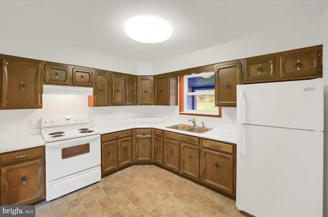 3315 E College Ave, Bellefonte, PA 16823 - kitchen featuring white appliances, exhaust hood, light countertops, and a sink