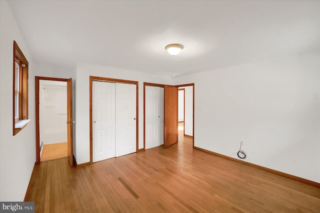 unfurnished bedroom featuring light hardwood / wood-style flooring