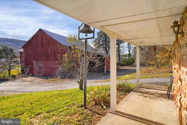 3315 E College Ave, Bellefonte, PA 16823 - view of patio / terrace featuring a barn and an outbuilding