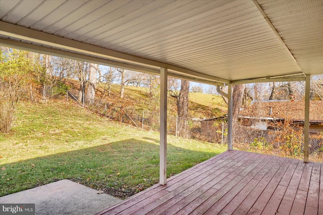 deck featuring a lawn