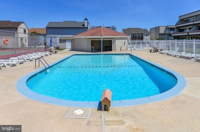 view of pool with a patio