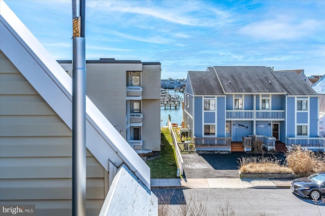 exterior space with a water view