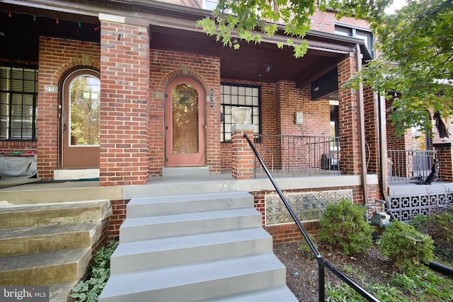 entrance to property with a porch