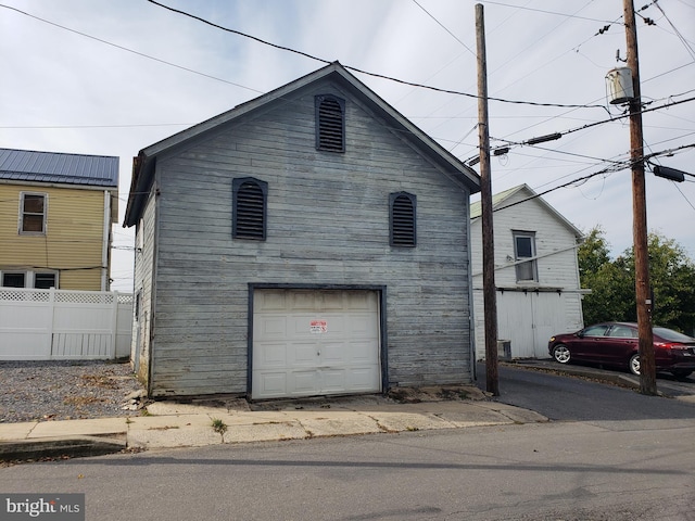 exterior space with a garage