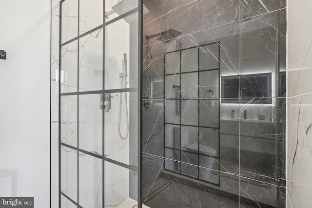 bathroom with tiled shower