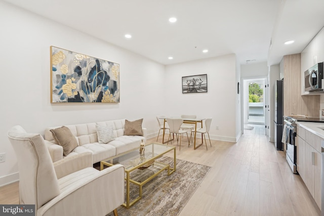 living room featuring light wood-type flooring