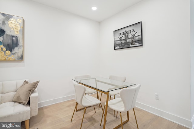 dining space featuring light hardwood / wood-style floors