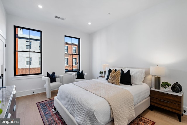 bedroom featuring light wood-type flooring