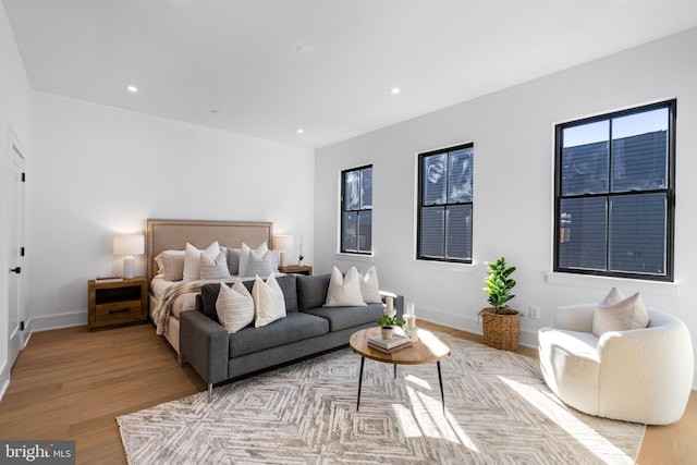 bedroom with light hardwood / wood-style flooring