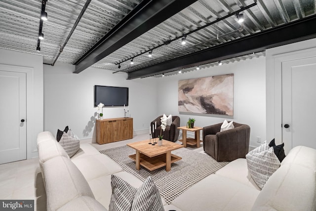 living room featuring beamed ceiling