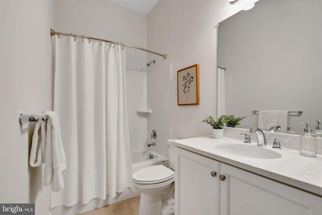 full bathroom with tile patterned flooring, vanity, toilet, and shower / bath combo with shower curtain