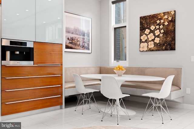 tiled dining area with breakfast area