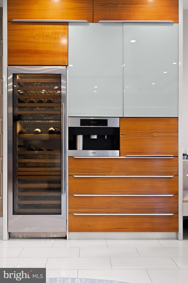 interior details featuring oven and beverage cooler