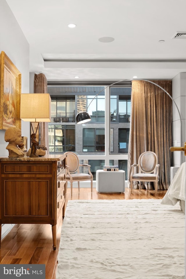 sitting room featuring hardwood / wood-style flooring