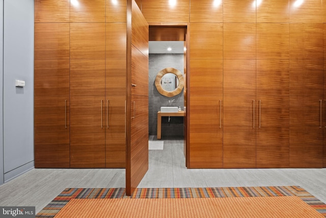 interior space featuring tile patterned flooring and vanity