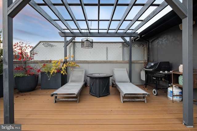 deck at dusk with a pergola