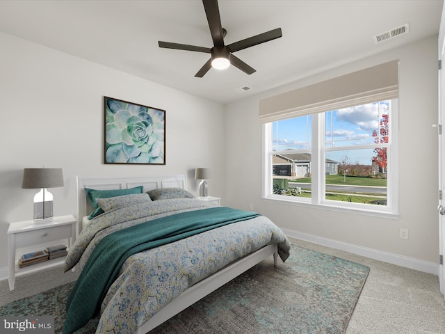 carpeted bedroom featuring ceiling fan