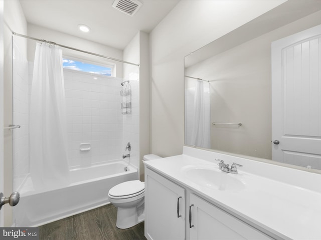 full bathroom featuring toilet, vanity, shower / bath combo, and hardwood / wood-style flooring