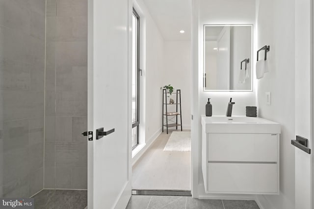 bathroom with vanity and tile patterned floors