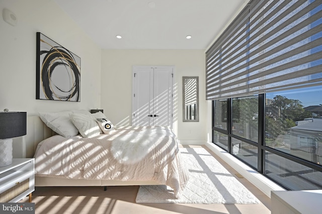 bedroom with hardwood / wood-style floors