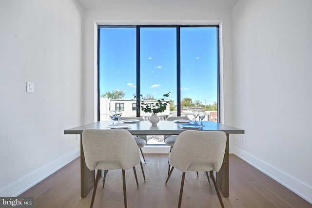 dining area featuring hardwood / wood-style flooring