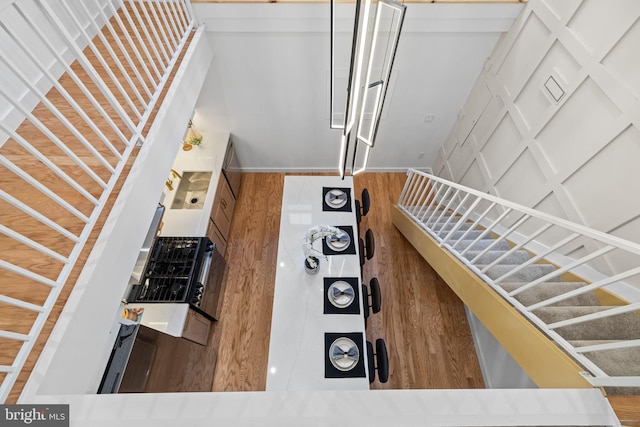 staircase featuring hardwood / wood-style floors