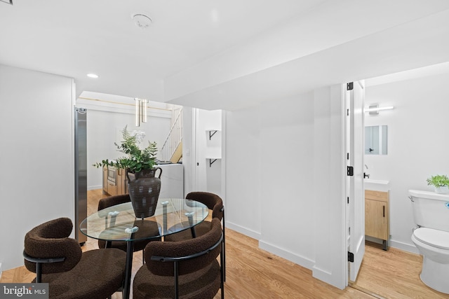 dining room featuring light hardwood / wood-style flooring