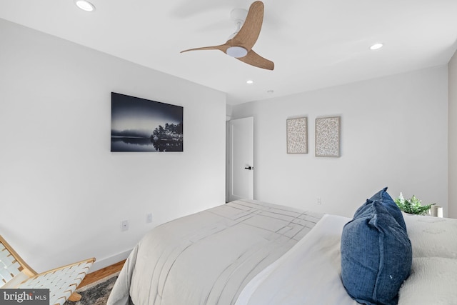 bedroom featuring ceiling fan and wood-type flooring