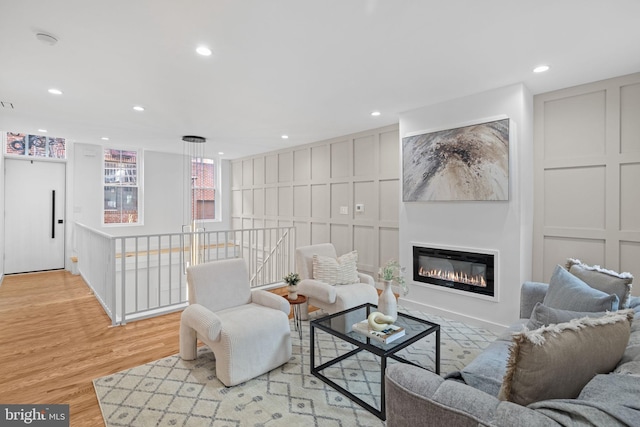 living room with light hardwood / wood-style floors