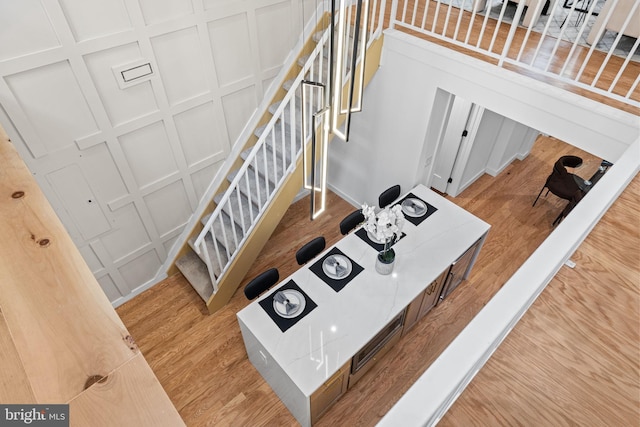 stairway featuring hardwood / wood-style floors