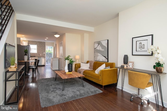 living room featuring dark hardwood / wood-style floors