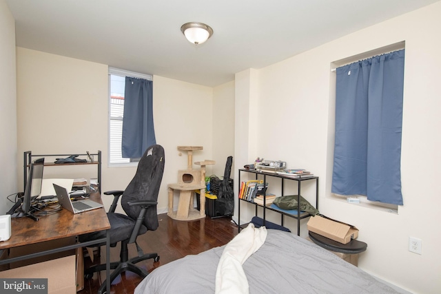 office area featuring dark wood-type flooring