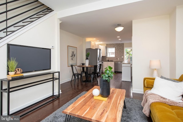 living room featuring dark hardwood / wood-style flooring