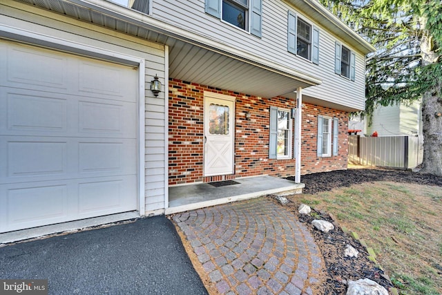 doorway to property featuring covered porch