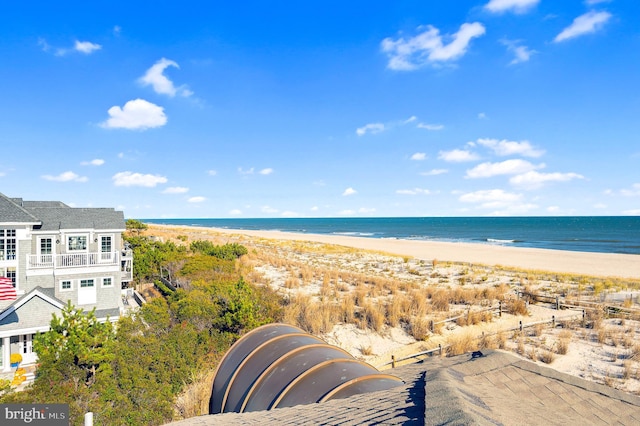 view of water feature with a beach view