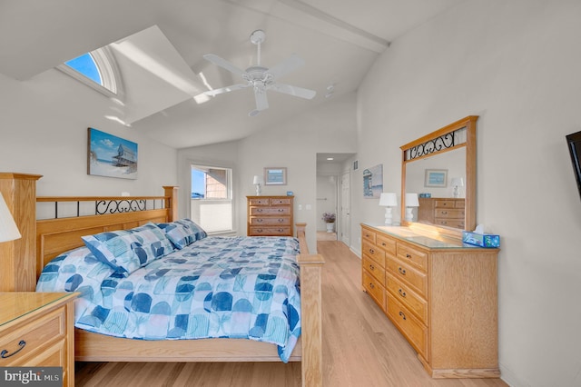 bedroom featuring beam ceiling, light wood-type flooring, high vaulted ceiling, and ceiling fan