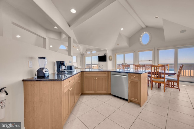 kitchen with dishwasher, beam ceiling, kitchen peninsula, and light tile patterned floors