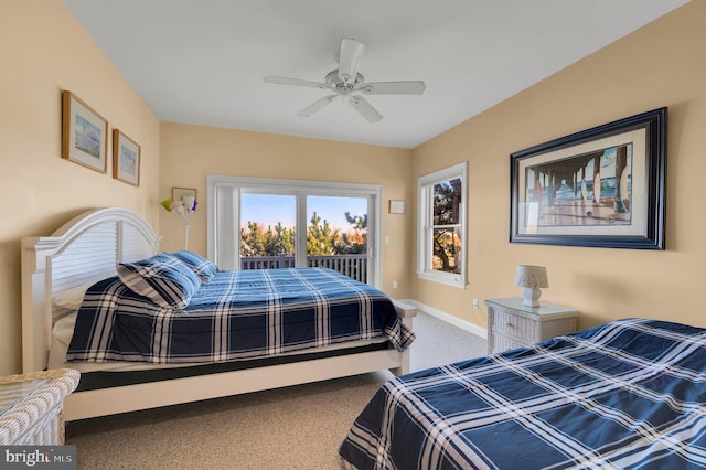 bedroom with carpet, access to outside, and ceiling fan