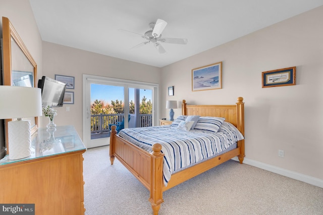 carpeted bedroom with access to outside and ceiling fan