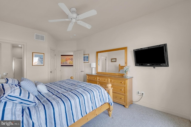 carpeted bedroom with ceiling fan