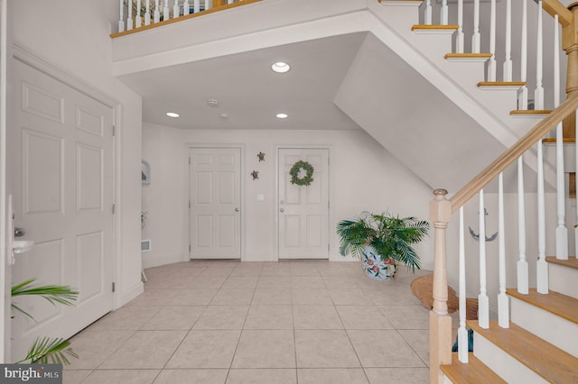 2 N 2nd St, Surf City, NJ 08008 - entryway featuring tile patterned flooring, recessed lighting, and stairway