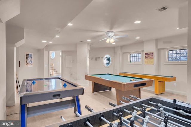 game room with ceiling fan and pool table