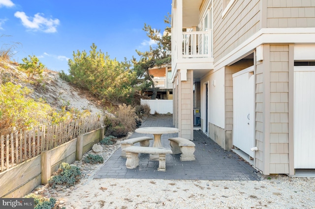 view of patio / terrace featuring a balcony